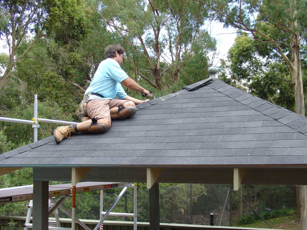 Easy DIY Gazebo Kits Assembly Australia DIY fixed gazebo kits being assembled in Australian backyard
