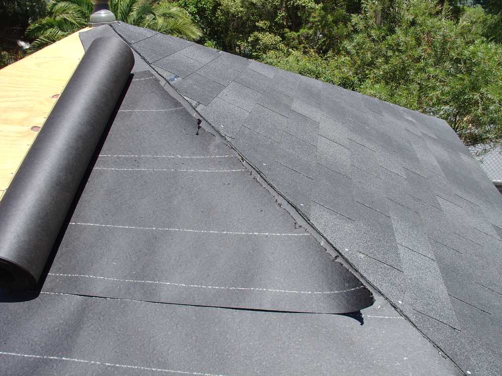 Installing Self-Adhesive Underlayment on Gazebo Roof Rolling out and installing synthetic underlayment over plywood roof deck on gazebo
