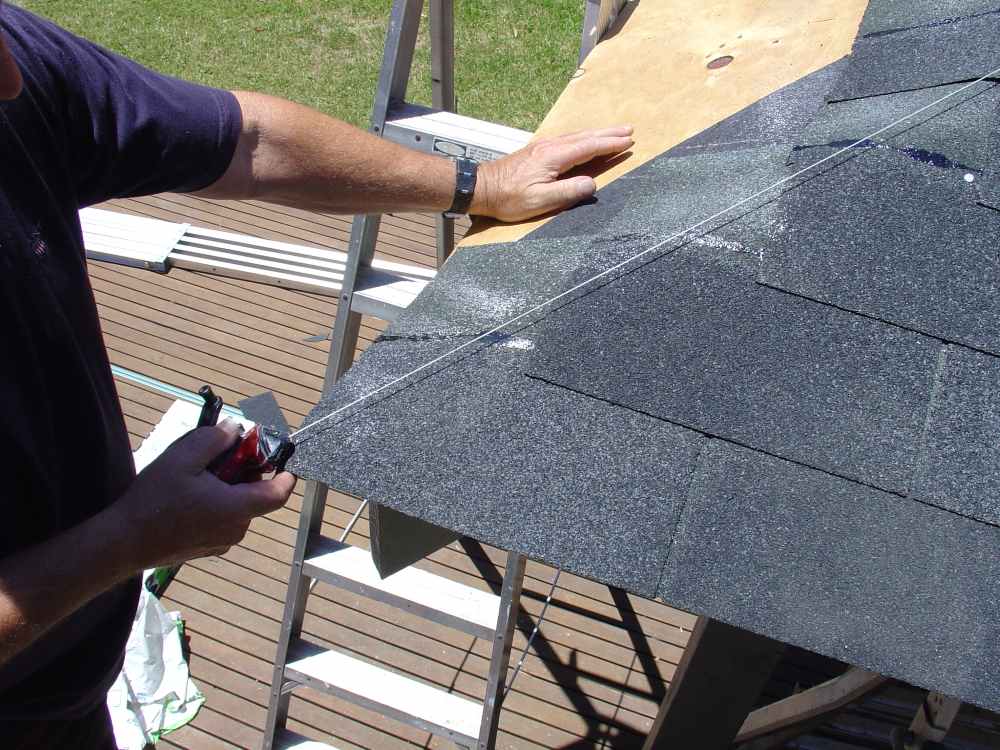Asphalt Shingle Courses Running into Hip Neat asphalt shingle courses installed up to the hip on gazebo roof Australia